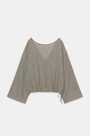 Chemise cape à carreaux