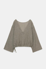 Chemise cape à carreaux
