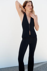 Pantalon coupe évasée extensible à pois