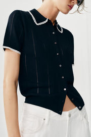 Veste polo en maille à dentelle et manches courtes