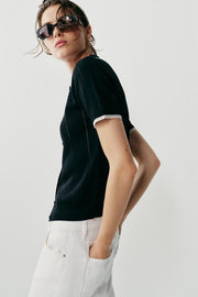 Veste polo en maille à dentelle et manches courtes