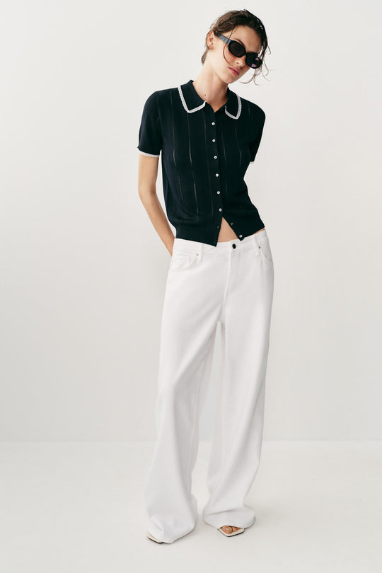 Veste polo en maille à dentelle et manches courtes