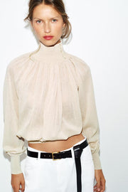 Blouse fluide en maille contrastée