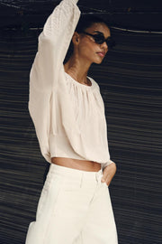 Blouse en maille à col bateau