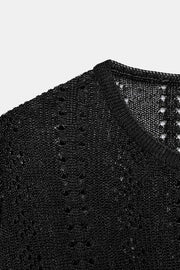 Pull en maille pointelle à fentes