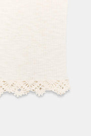 Top en maille à bas crocheté