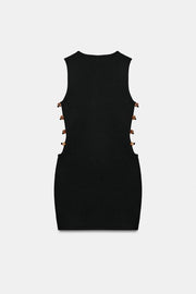 Robe courte en maille à fentes et perles