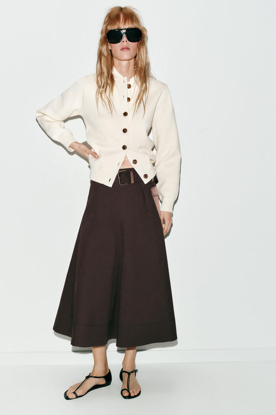 Veste en maille à bouton contrasté