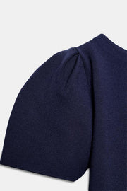 Robe courte en maille à manches bouffantes