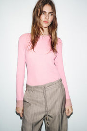 Pantalon à chevrons avec ceinture tressée