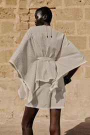 Gilet à carreaux effiloché