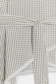 Gilet à carreaux effiloché