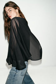Blouse contrastée effet cape