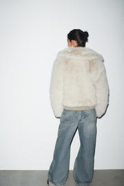 Manteau court effet fourrure à fermeture zippée