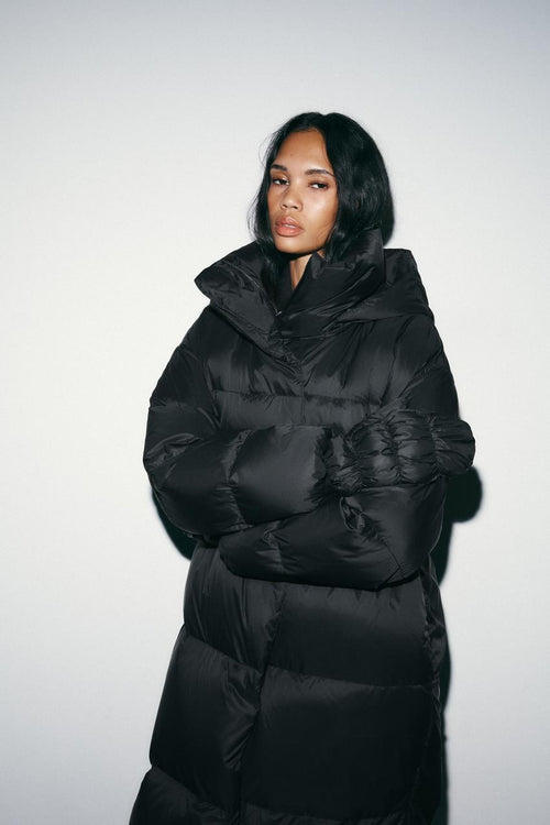 Anorak matelassé 70 % duvet, 30 % plumes, à capuche et gants, déperlant