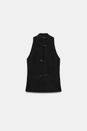 Top peplum à brandebourgs