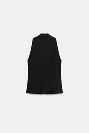Top peplum à brandebourgs