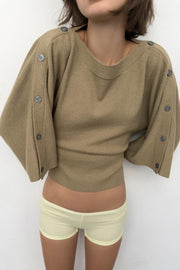 Pull en maille à manches cape et boutons