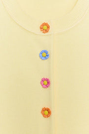 Veste en maille à boutons fleur
