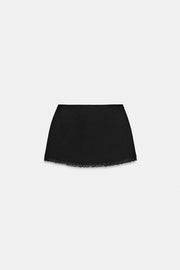 Jupe mini extensible en dentelle