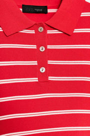 Polo en maille rayée à manches courtes