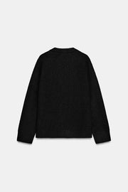 Pull uni en maille à col V