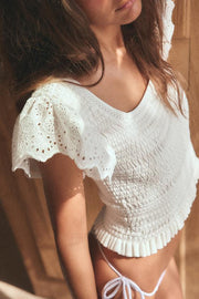 Top en maille à broderies ajourées