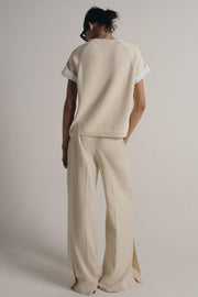 Pull en maille à manches contrastées avec revers