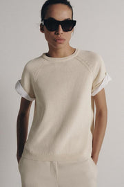 Pull en maille à manches contrastées avec revers