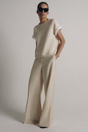 Pull en maille à manches contrastées avec revers