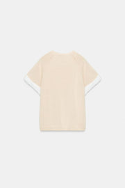 Pull en maille à manches contrastées avec revers