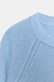 Pull en maille à bas arrondi et manches courtes