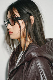Blouson effet cuir à capuche