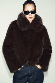Manteau court effet fourrure à col revers
