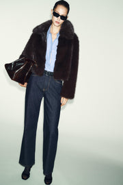 Manteau court effet fourrure à col revers