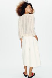 Veste en maille pointelle