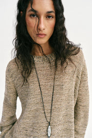 Pull en maille à fil métallisé