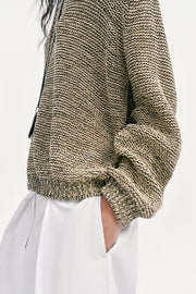 Pull en maille à fil métallisé