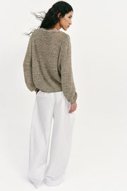 Pull en maille à fil métallisé