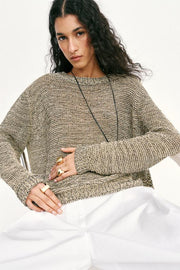 Pull en maille à fil métallisé