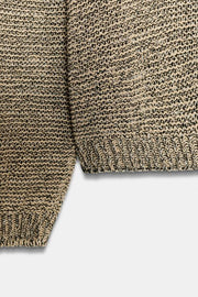 Pull en maille à fil métallisé