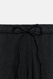 Pantalon fluide à coutures apparentes