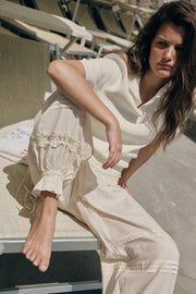 Pantalon bouffant à plis en dentelle