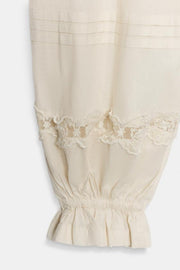 Pantalon bouffant à plis en dentelle