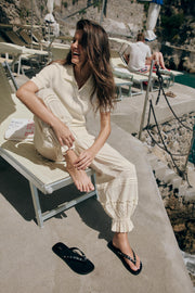 Pantalon bouffant à plis en dentelle