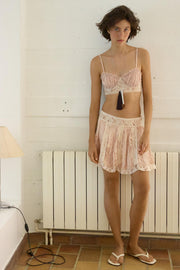 Jupe mini plissée en dentelle à perles