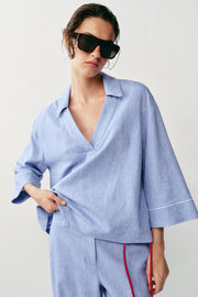 Blouse en lin à détails passepoilés
