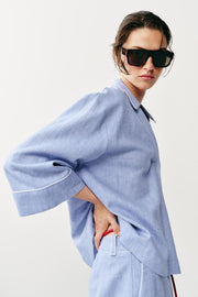 Blouse en lin à détails passepoilés