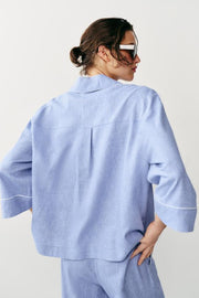 Blouse en lin à détails passepoilés