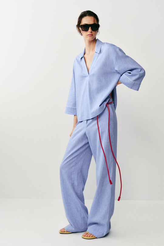 Blouse en lin à détails passepoilés